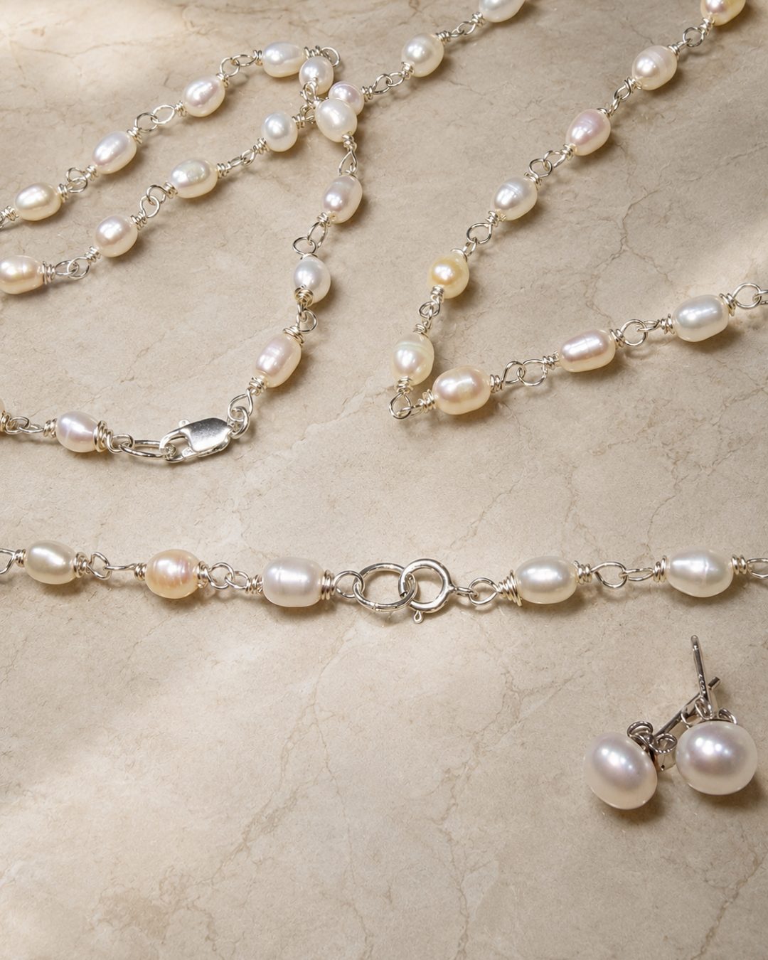 Set Nácar — collar, pulsera y aretes de perlas